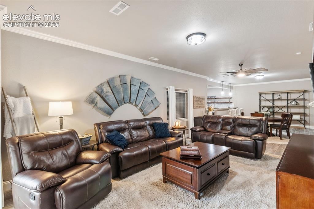 Image 24 of 40: Basement Family room/great room with walkout to outdoor entertainment area