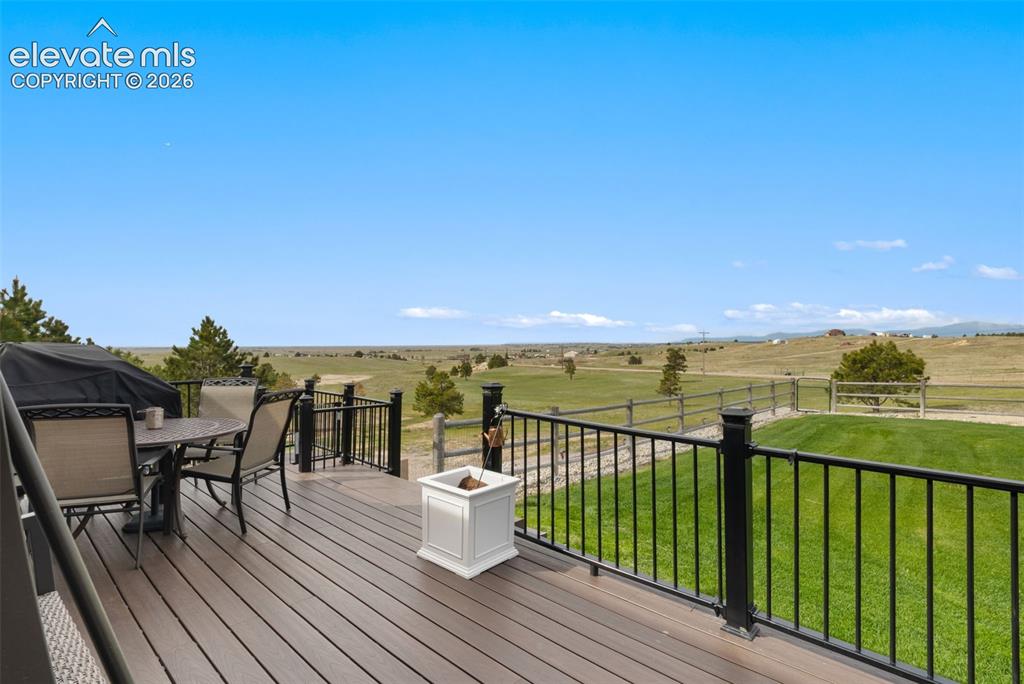 Image 34 of 40: Walk out deck featuring composite decking and views views views