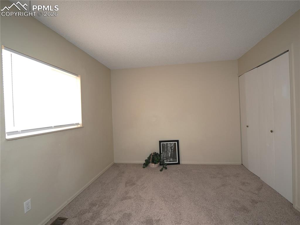 Image 21 of 30: Bedroom