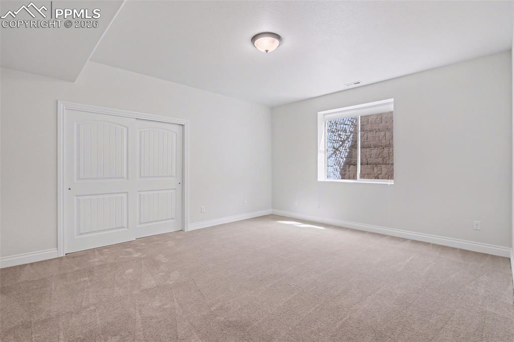 Image 40 of 50: Bedroom