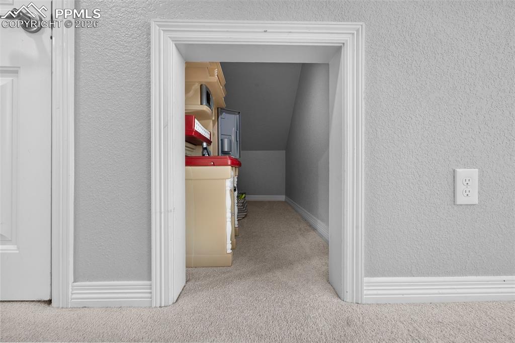 Image 22 of 34: Basement under stair area