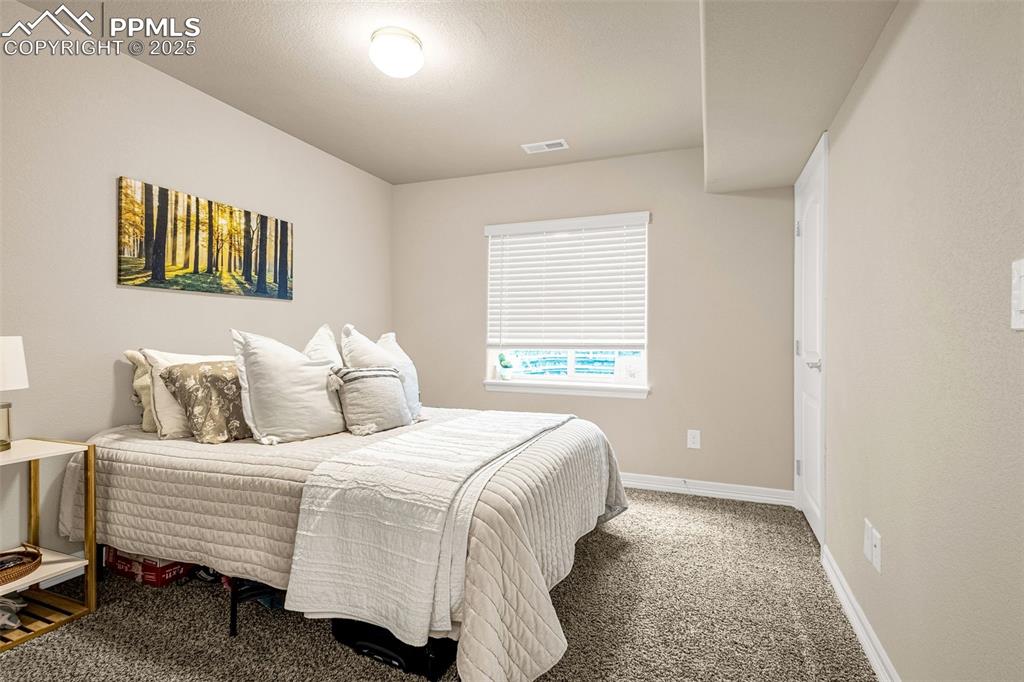 Image 25 of 34: Bedroom