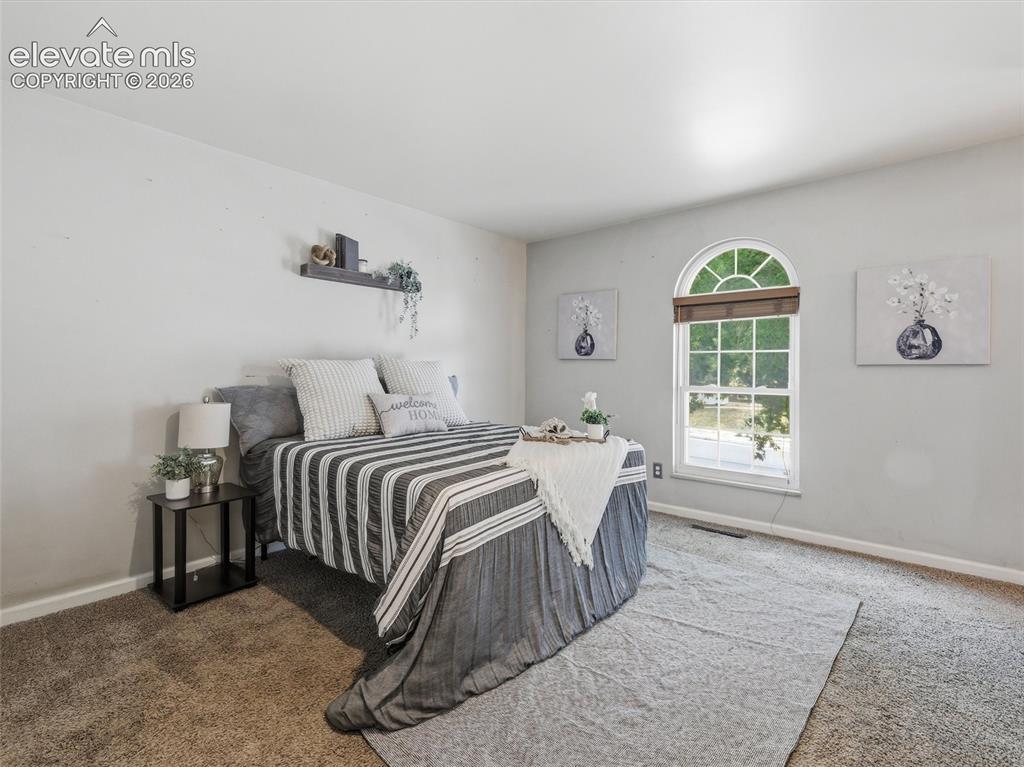 Image 14 of 38: Bedroom