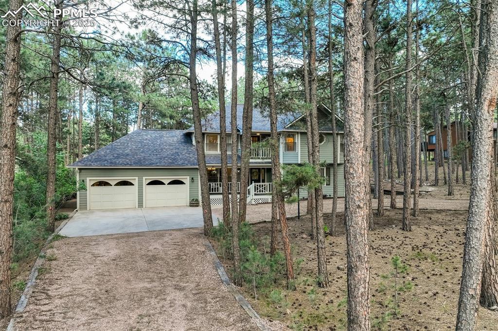 Caption: Gorgeous home nestled in majestic Ponderosa Pines!