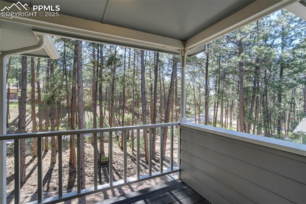 Image 22 of 50: This balcony on the upper level is the perfect place to enjoy the sunrise!