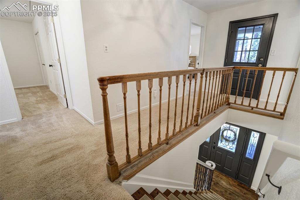 Image 30 of 50: Four bedrooms, two bathrooms and balcony on upper level