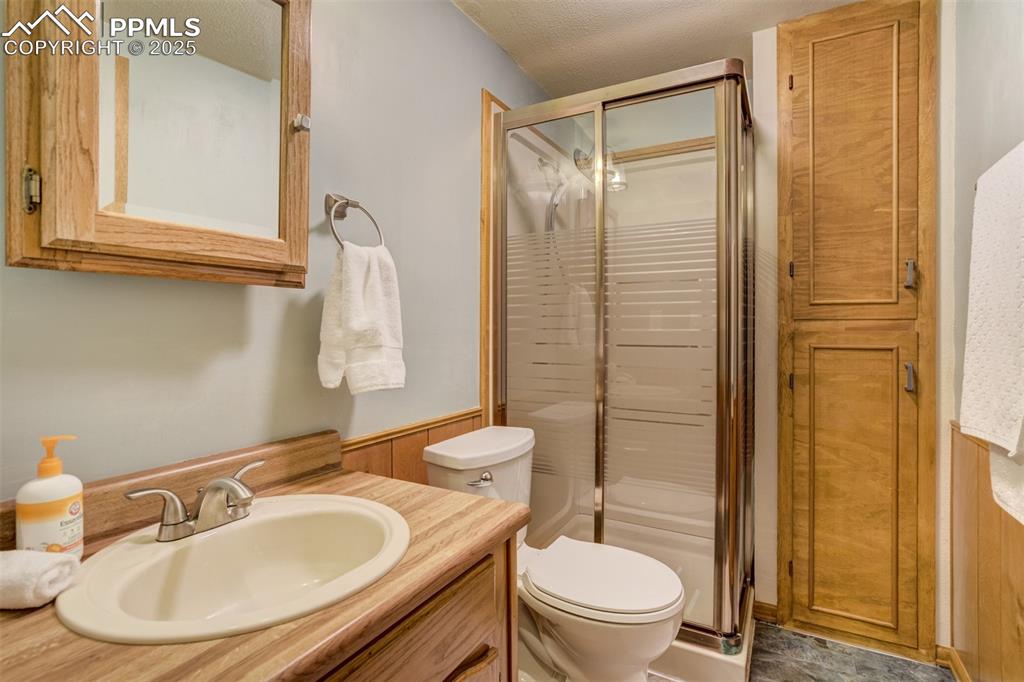 Image 40 of 50: A 3/4 bathroom in the Junior Suite