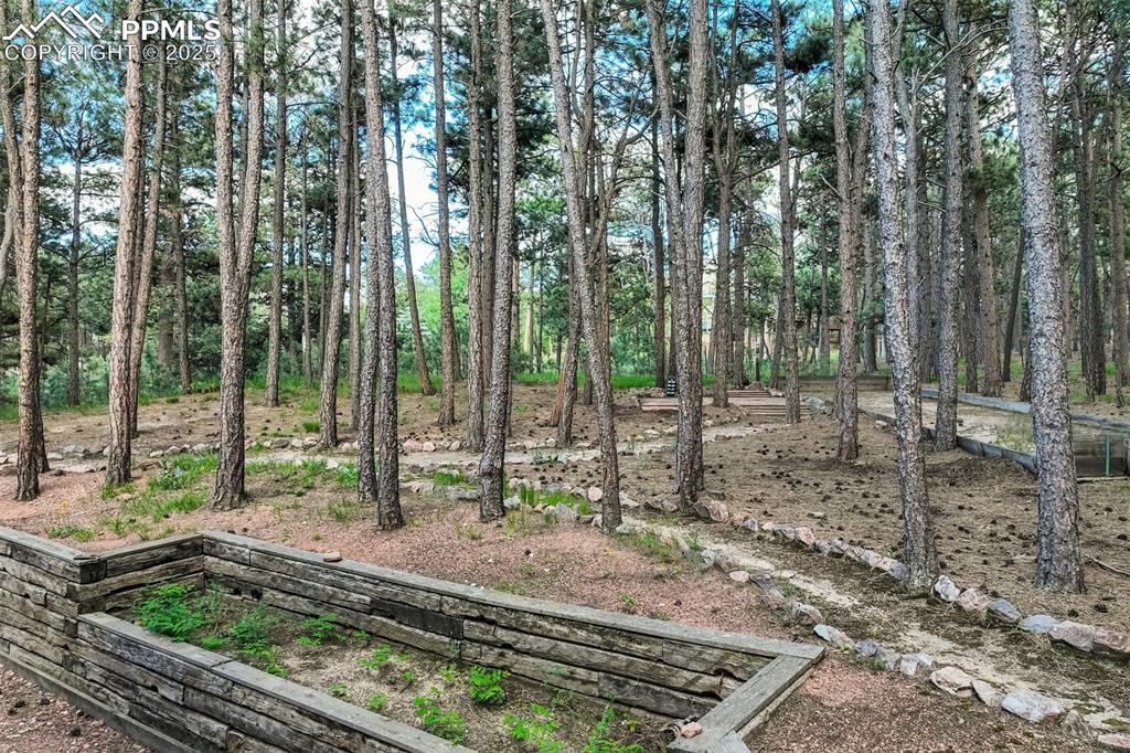 Image 47 of 50: Enjoy planter boxes, trails, and plenty of versatile space!