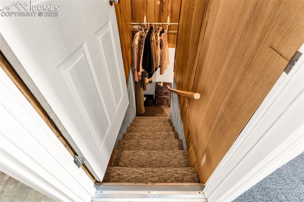 Image 13 of 44: The door to the basement near the laundry. 