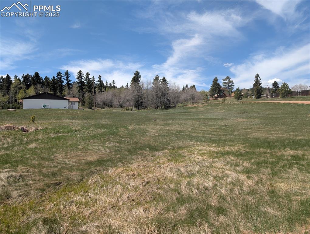 Image 4 of 12: View of green lawn featuring a view of rural / pastoral area