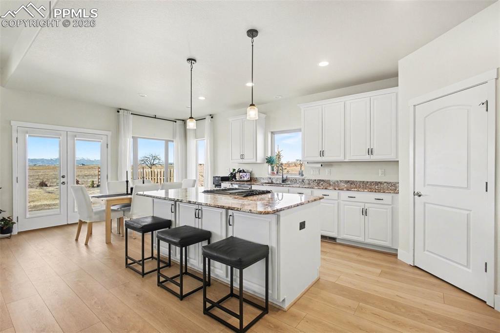 Image 11 of 49: White cabinets