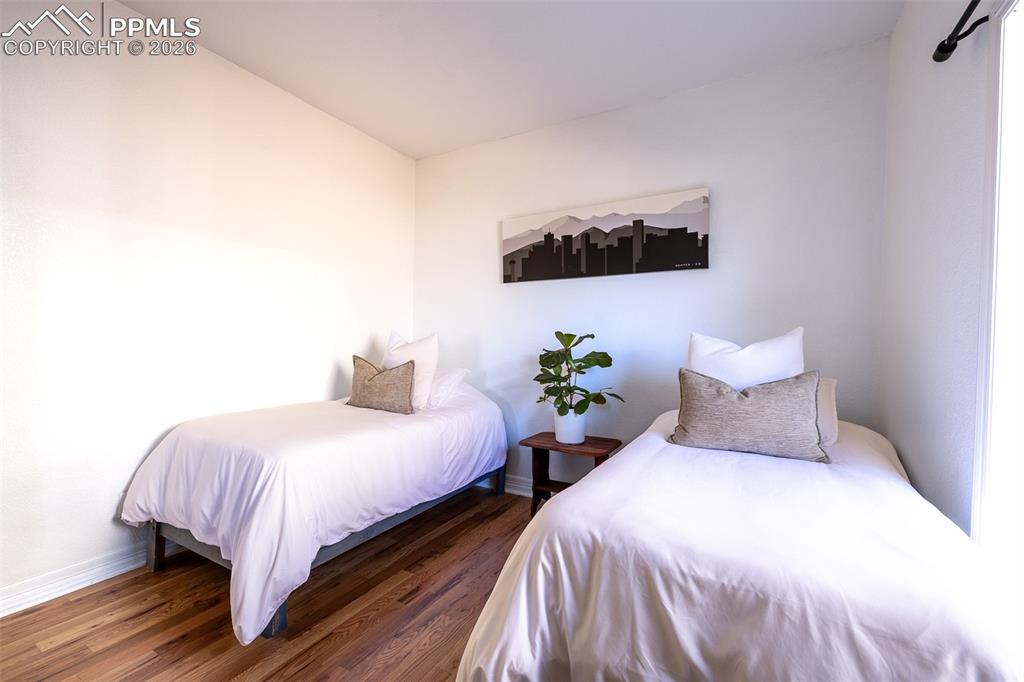 Image 22 of 50: 1st floor bedroom by entry