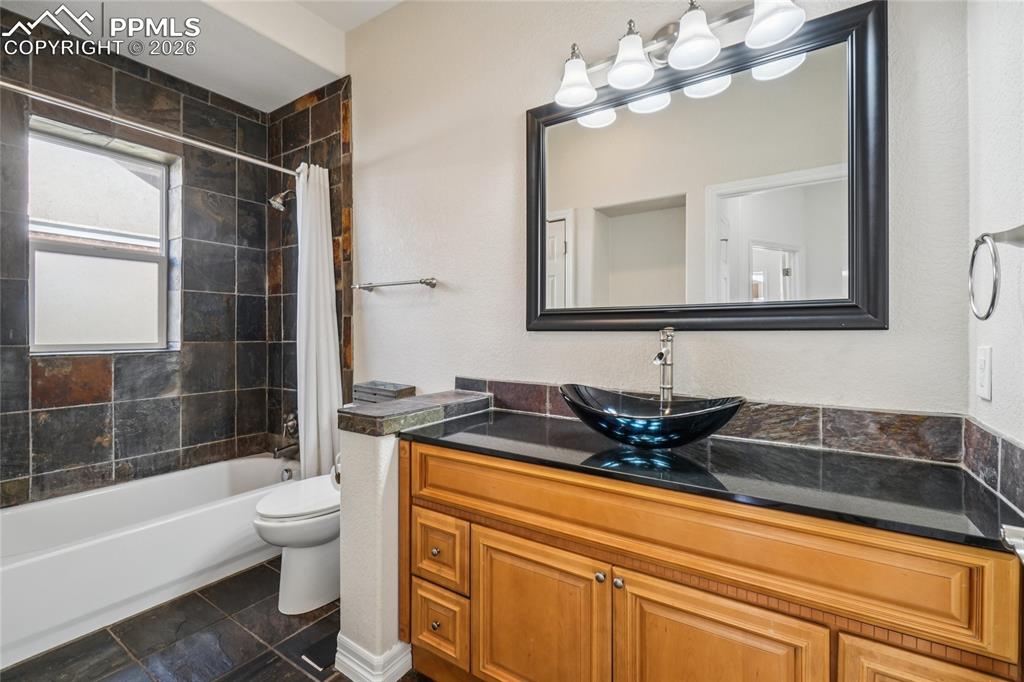 Image 23 of 50: 1st floor full bathroom