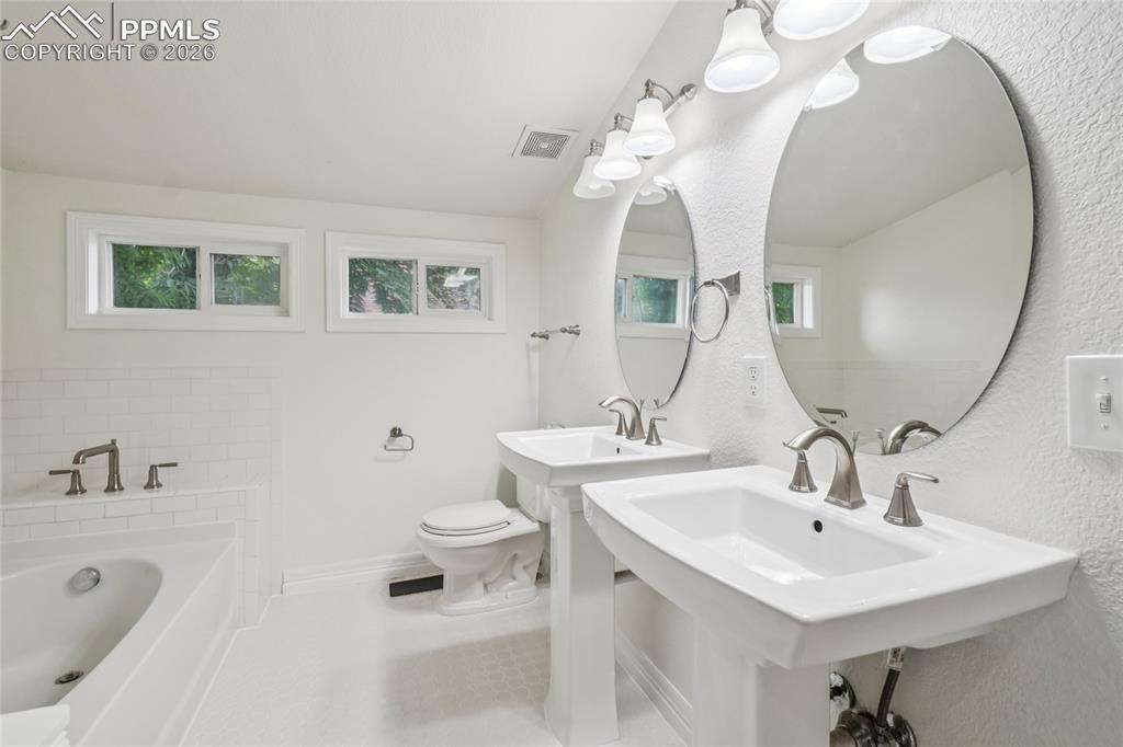 Image 26 of 50: 2nd floor primary bathroom