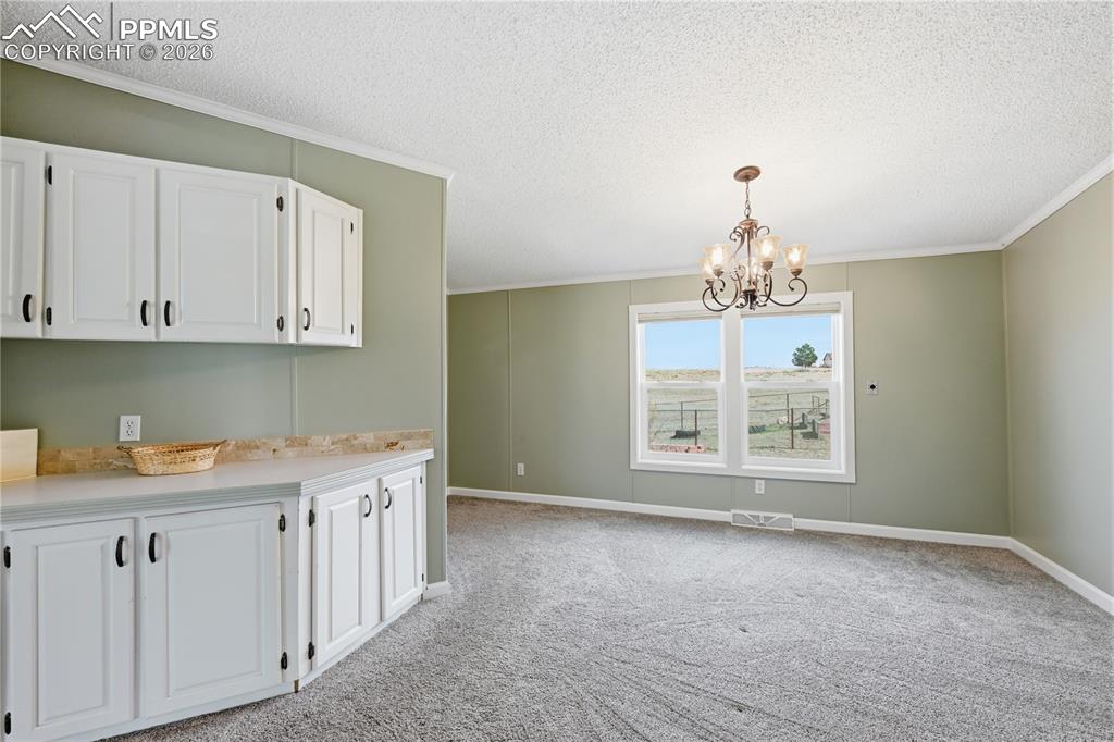Image 8 of 40: Formal dining room