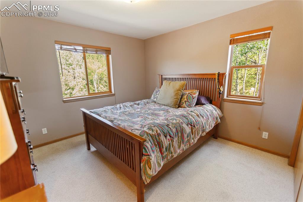 Image 13 of 30: Main level bedroom 2