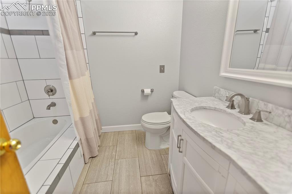 Image 15 of 30: Main level bath