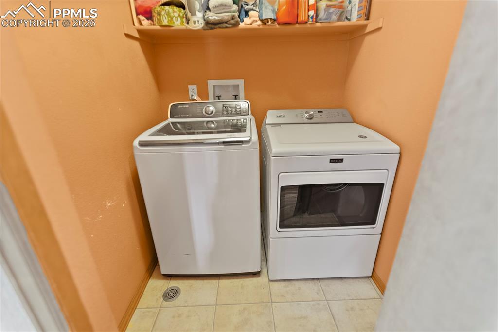 Image 18 of 30: Main level laundry