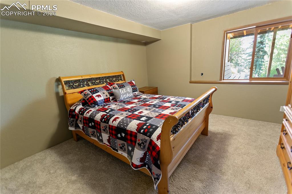 Image 23 of 30: Lower level bedroom 4