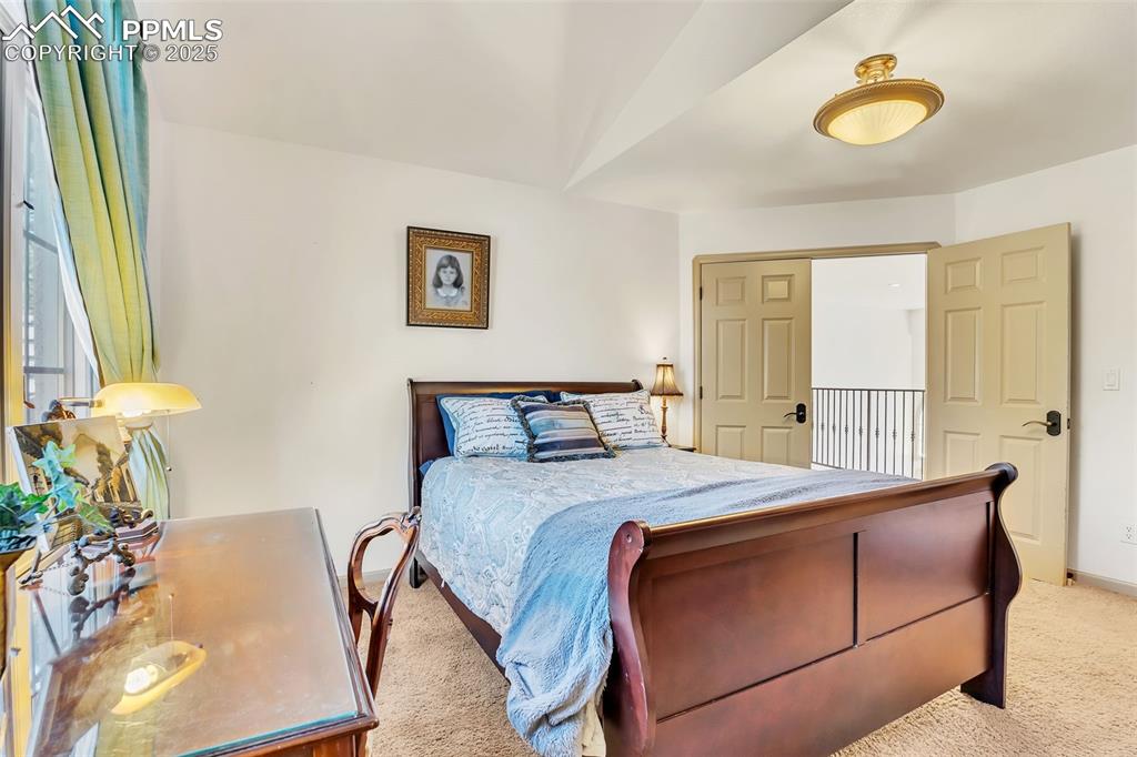 Image 22 of 45: Bedroom featuring carpet floors and baseboards