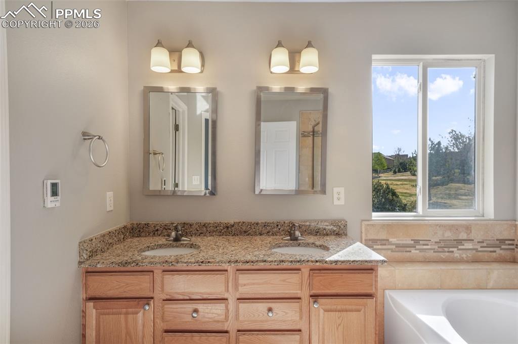 Image 25 of 50: Master Bedroom