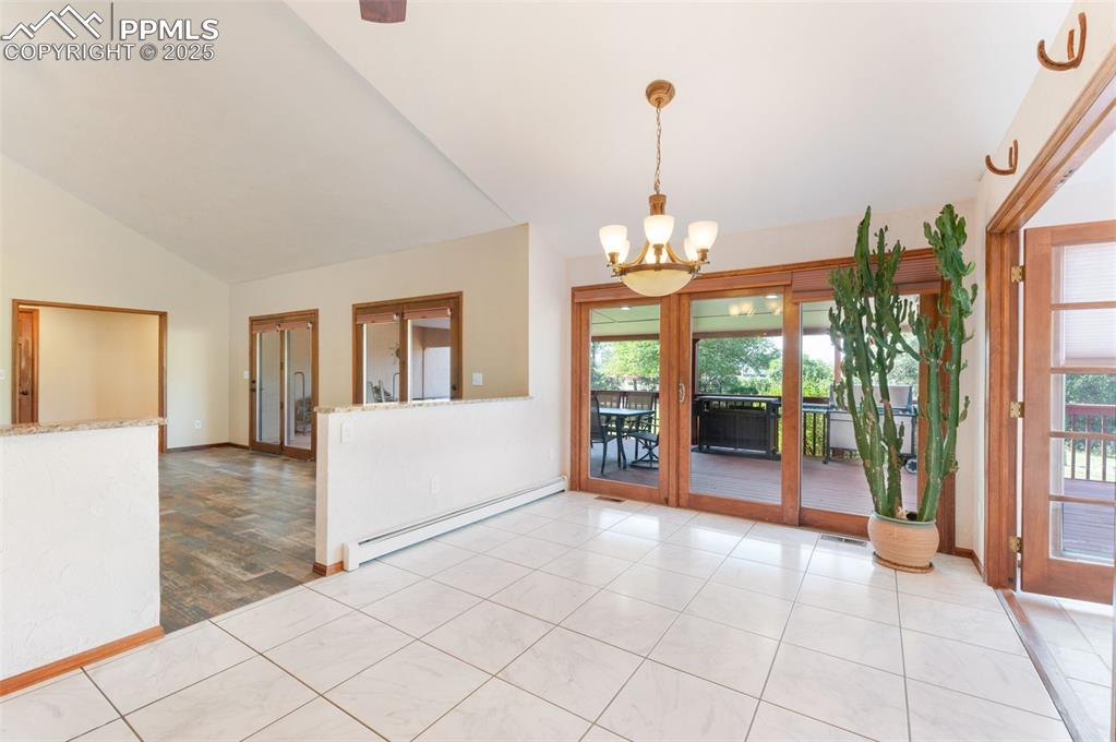 Image 13 of 50: Very Nice Casual Dining Area With Marble Floor And Access To Back Deck & Su