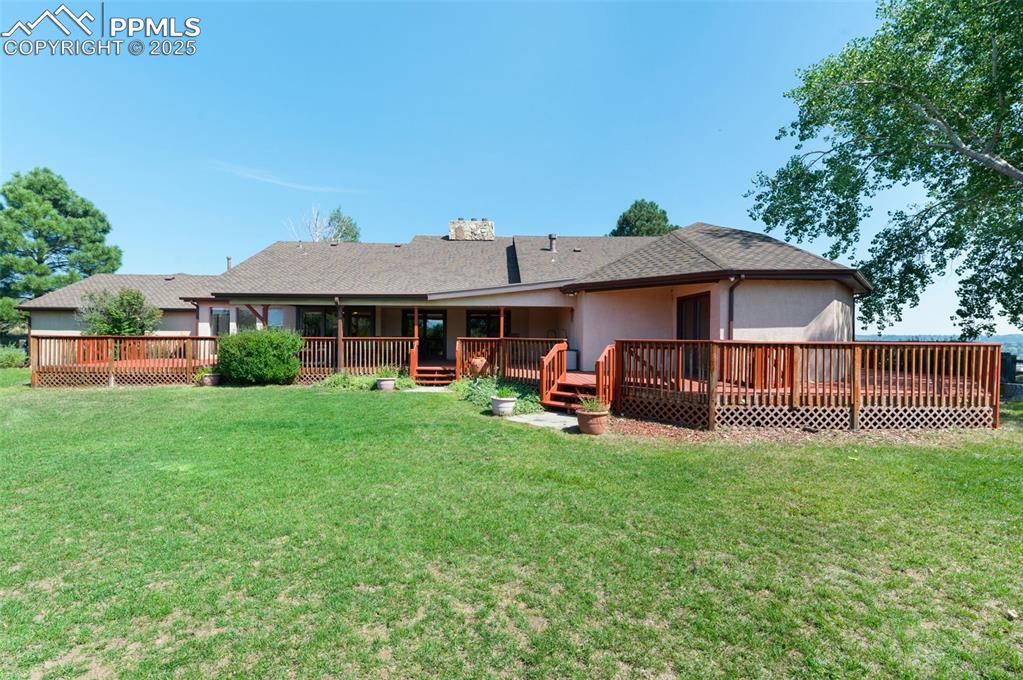 Image 2 of 50: Gorgeous Mostly Covered Deck In Back Yard