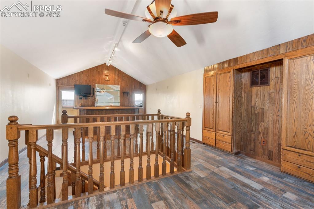 Image 32 of 50: Loft With Media Center & Wood Bar At Opposite End