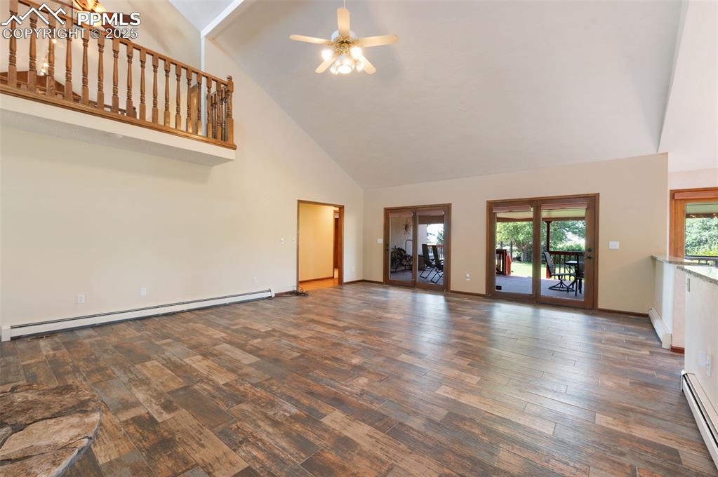 Image 7 of 50: Beautiful Natural Wood Floor.  Walk-Out To Patio Or Nice Sunroom Accessed T