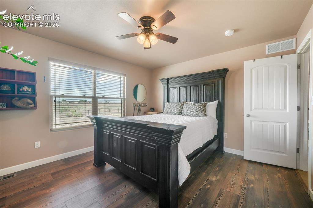 Image 16 of 50: Master Bedroom
