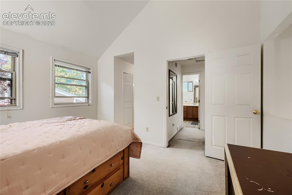 Image 19 of 37: Vaulted ceiling with dual windows
