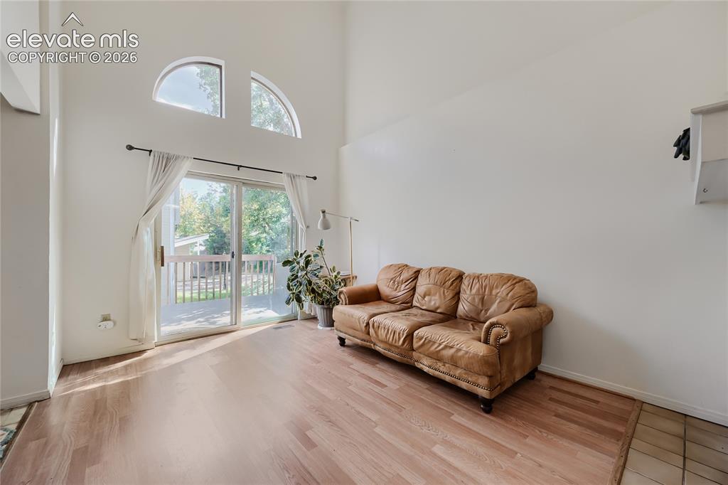 Image 5 of 37: Vaulted ceilings with arched windows