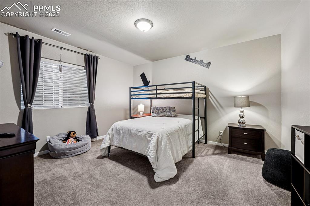 Image 23 of 31: Bedroom