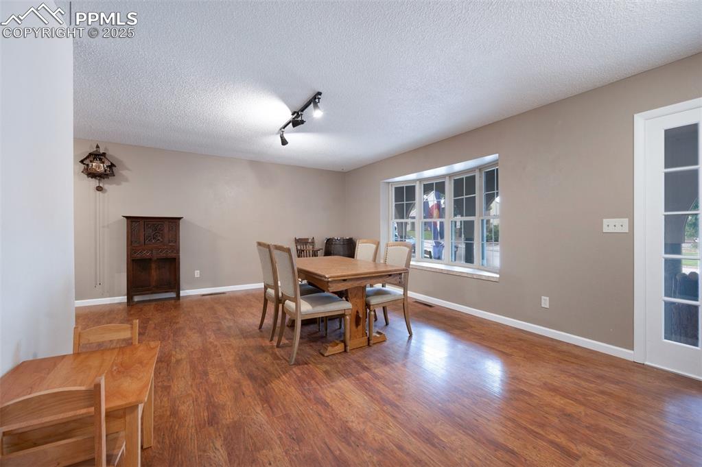 Image 6 of 46: Living Room with bay window