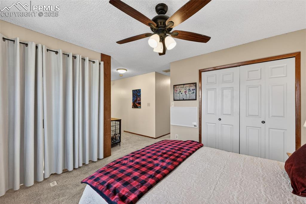 Image 22 of 38: Bedroom