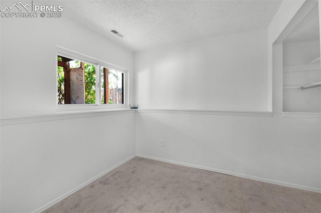 Image 24 of 33: Bedroom