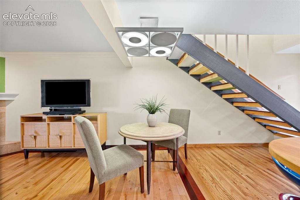 Image 13 of 48: Open-tread staircase with metal stringers and railings