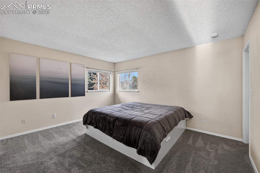 Image 13 of 33: Bedroom