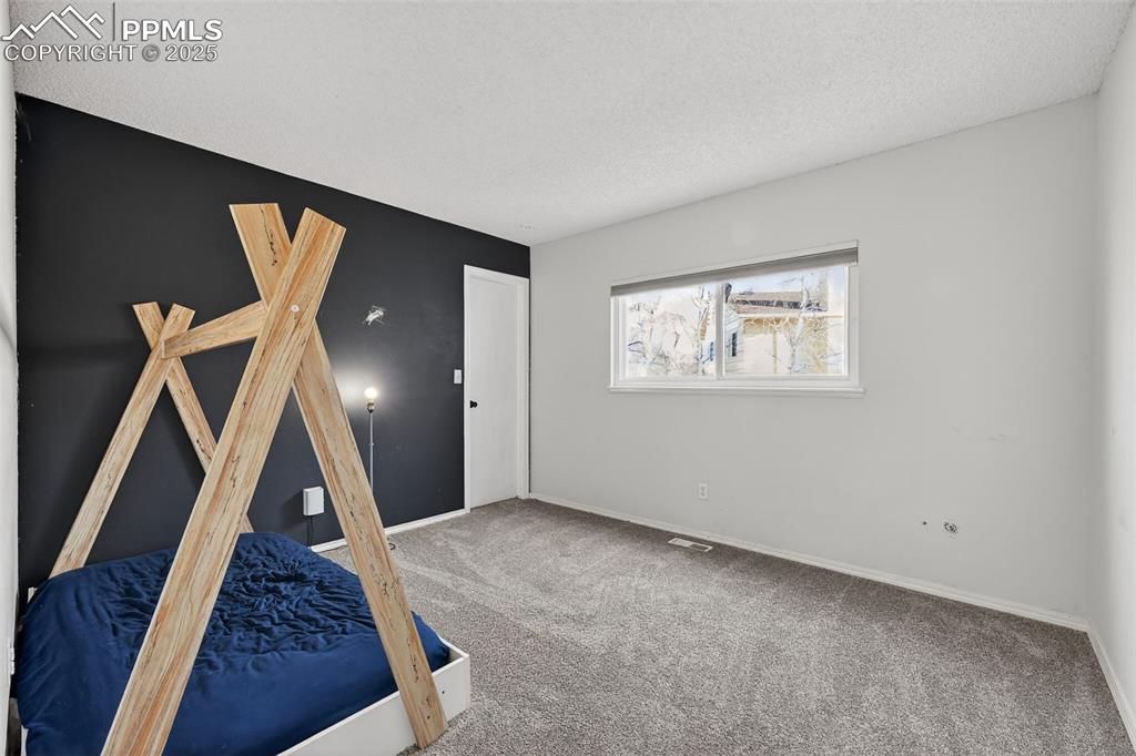 Image 16 of 33: Bedroom