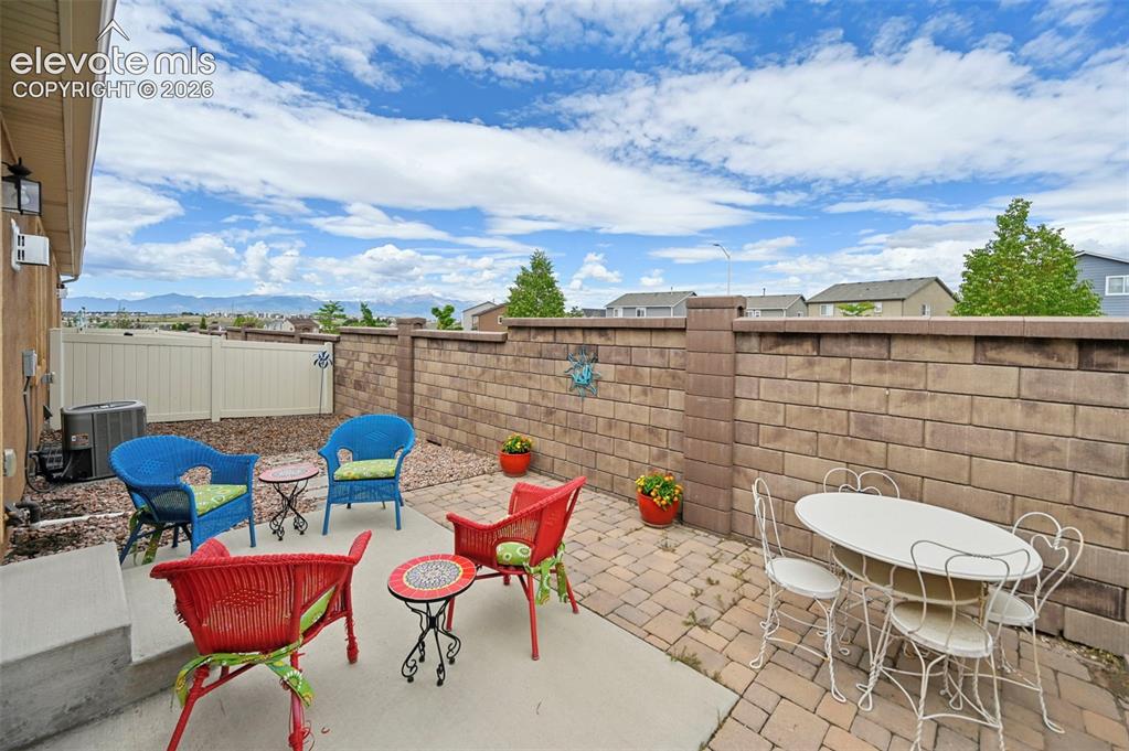 Image 37 of 38: Large patio area where you can relax and enjoy the view!