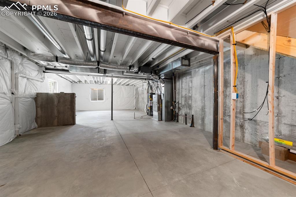 Image 12 of 16: Unfinished Basement