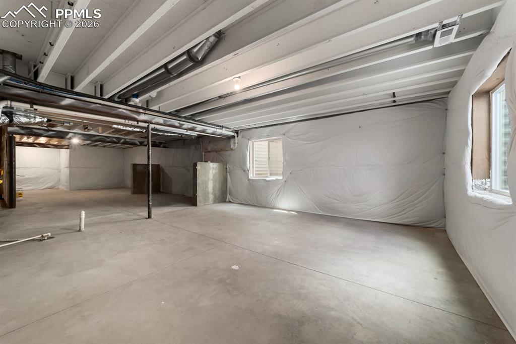 Image 13 of 16: Unfinished Basement