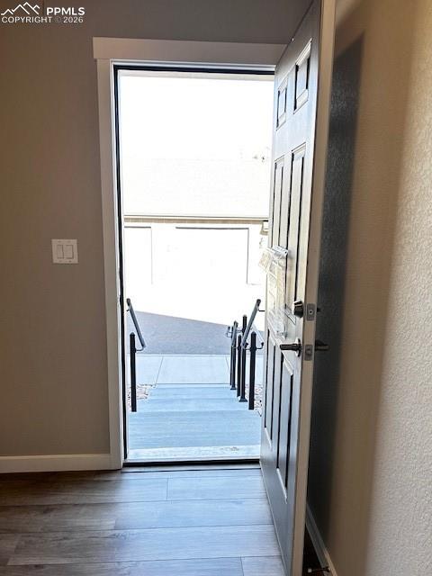 Image 7 of 16: Back entrance from detached garage.