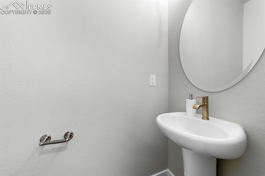 Image 8 of 16: Main Level Powder Room