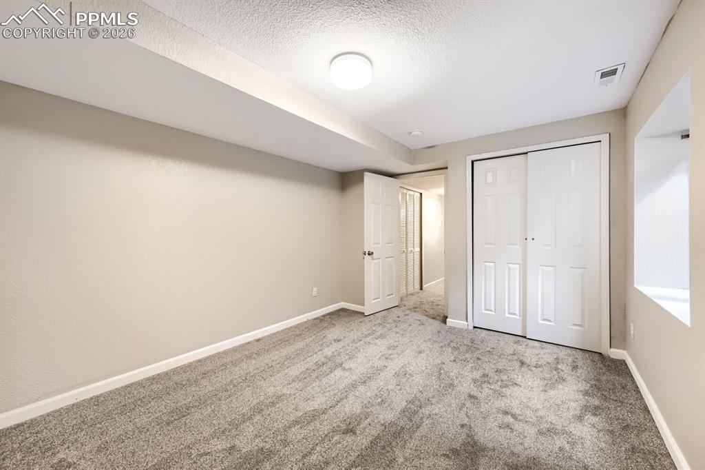 Image 24 of 26: Bedroom