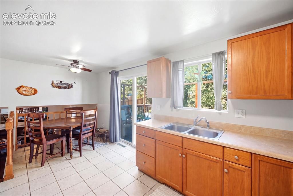 Image 11 of 39: Main level.  AI removed items from kitchen/dining room