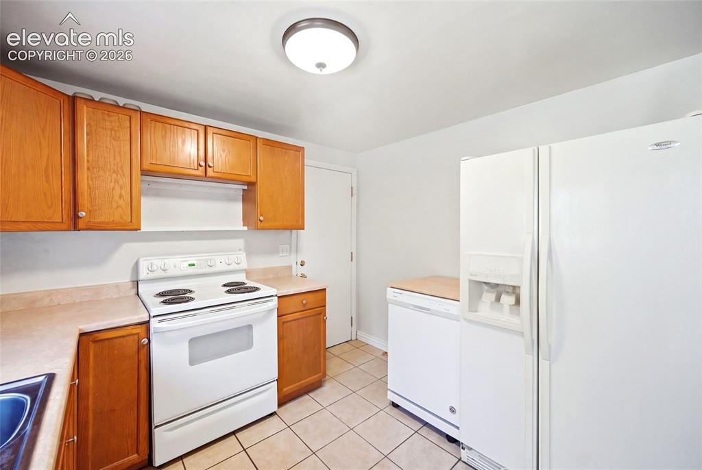Image 13 of 39: Main level. AI removed items from kitchen