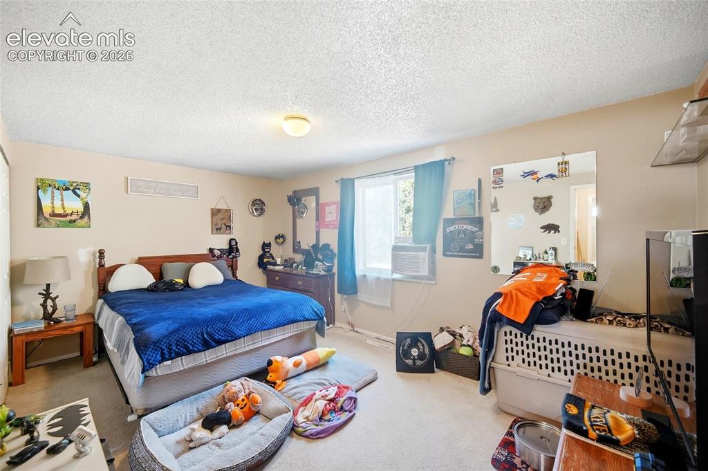 Image 18 of 39: Upper level primary bedroom