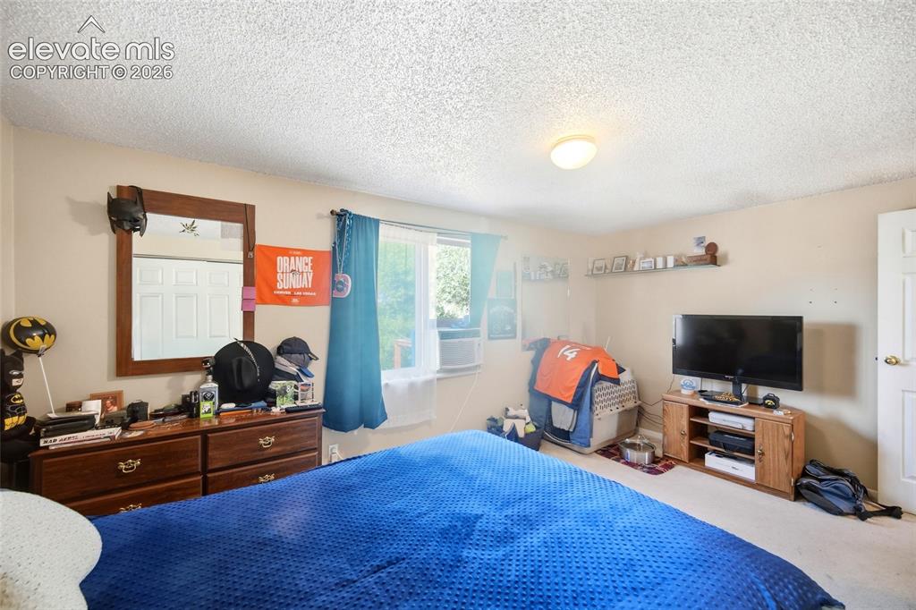 Image 19 of 39: Upper level primary bedroom