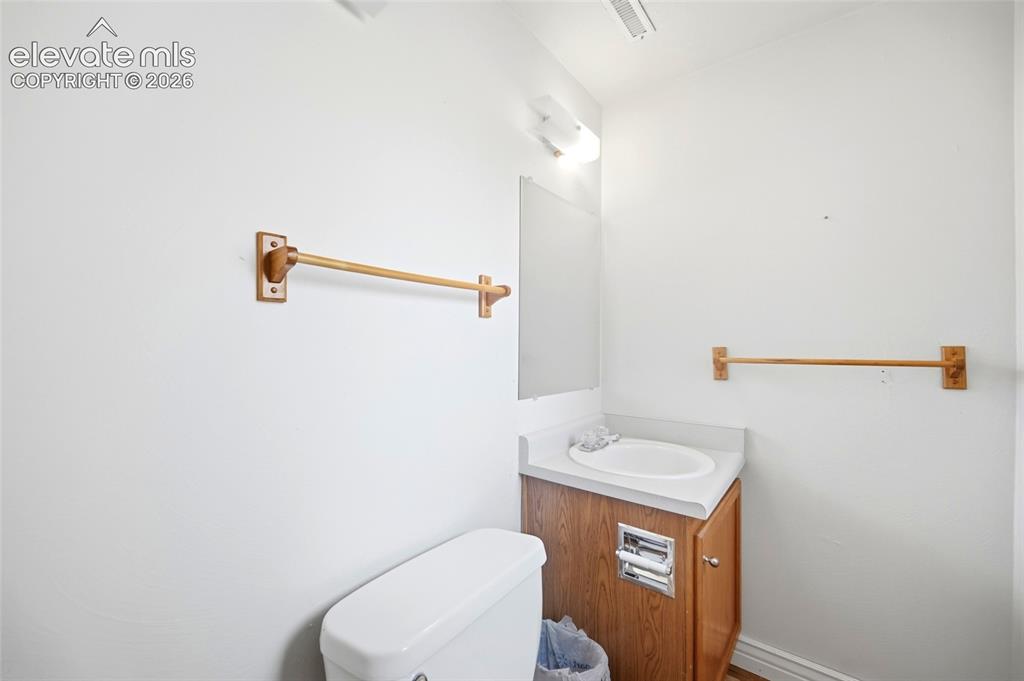 Image 30 of 39: Lower level bathroom adjoins bedroom